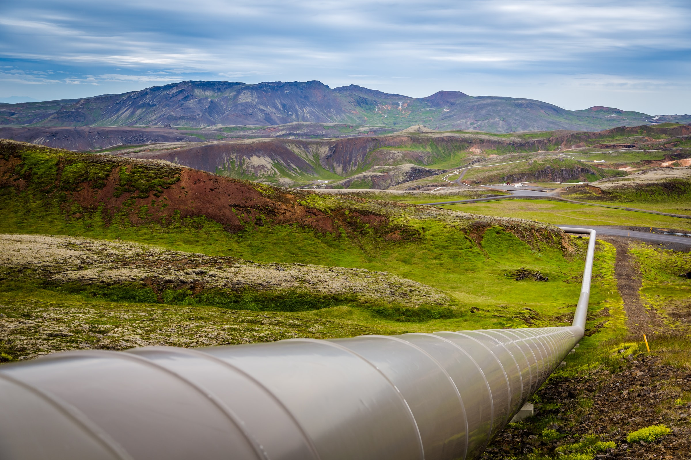 An oil and gas pipeline going through the mountains.